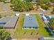 Aerial view displays the home's position within the community, surrounded by mature trees at 4131 Bula Ln, North Port, FL 34287