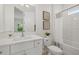 Clean bathroom with a white vanity, subway tile shower, and a bright, fresh ambiance at 4637 Irdell Ter, North Port, FL 34288