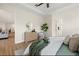 Comfortable bedroom offering an en-suite bathroom, dresser and inviting decor at 4637 Irdell Ter, North Port, FL 34288