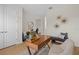 Stylish home office with a wooden desk, comfortable seating, and elegant decor for a productive workspace at 4637 Irdell Ter, North Port, FL 34288