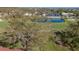 Community overview featuring a pond and lush green landscape at 766 Village Cir # 225, Venice, FL 34292