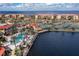Community pool and tennis courts near the water at 95 Vivante Blvd # 9534, Punta Gorda, FL 33950