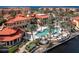 Aerial view of waterfront community with pool and lush landscaping at 95 Vivante Blvd # 9534, Punta Gorda, FL 33950