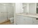 Clean bathroom with a walk-in shower and white vanity at 95 Vivante Blvd # 9534, Punta Gorda, FL 33950