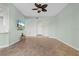 Open concept living room with tile floors and entryway at 95 Vivante Blvd # 9534, Punta Gorda, FL 33950