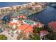 Aerial view showing resort amenities including pools and tennis at 95 Vivante Blvd # 9534, Punta Gorda, FL 33950