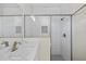 Bathroom with shower, white subway tiles, and modern fixtures at 1100 S Wapello St, North Port, FL 34286