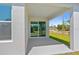 Covered outdoor patio with sliding glass doors to bring the outside in at 1100 S Wapello St, North Port, FL 34286