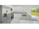 Modern kitchen with stainless steel appliances and granite countertops at 11505 3Rd Ave, Punta Gorda, FL 33955