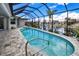 Refreshing pool and spa with screened enclosure at 1450 Kiwi Ct, Punta Gorda, FL 33950
