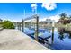 Private boat lift on the canal at 1450 Kiwi Ct, Punta Gorda, FL 33950