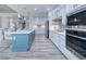 Modern kitchen with stainless steel appliances and white shaker cabinets at 1450 Kiwi Ct, Punta Gorda, FL 33950