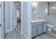 Guest bathroom with single vanity and view of bedroom at 1450 Kiwi Ct, Punta Gorda, FL 33950