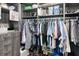 Large walk-in closet with ample hanging and shelving space at 1450 Kiwi Ct, Punta Gorda, FL 33950