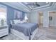 Bright bedroom with a king-size bed and built-in storage at 1450 Kiwi Ct, Punta Gorda, FL 33950