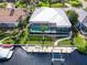 House with pool and canal access from above at 1450 Kiwi Ct, Punta Gorda, FL 33950