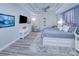 Main bedroom with a king-size bed and plenty of natural light at 1450 Kiwi Ct, Punta Gorda, FL 33950