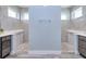 Modern bathroom with walk-in shower and double vanity at 1450 Kiwi Ct, Punta Gorda, FL 33950