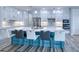 Spacious kitchen with large island, white cabinets, and stainless steel appliances at 1450 Kiwi Ct, Punta Gorda, FL 33950