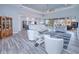 Bright living room features open concept floor plan and hardwood floors at 1450 Kiwi Ct, Punta Gorda, FL 33950