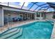 Large pool with spa and screened patio at 1450 Kiwi Ct, Punta Gorda, FL 33950
