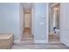 Light and airy hallway with wood-look flooring at 1450 Kiwi Ct, Punta Gorda, FL 33950