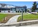 Curved walkway leading to the back of the house at 1450 Kiwi Ct, Punta Gorda, FL 33950