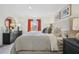 Comfortable bedroom features coordinated bedding, stylish furniture, and serene ambiance for a relaxing retreat at 16307 Alcira Cir, Punta Gorda, FL 33955