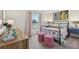 Cozy bedroom with an iron bed frame and unique, dog-themed decor at 16307 Alcira Cir, Punta Gorda, FL 33955