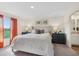Bright bedroom with coordinated decor, comfortable bedding, and ample natural light creates a welcoming space at 16307 Alcira Cir, Punta Gorda, FL 33955