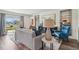 Stylishly decorated living room with comfortable seating, accent tables, and a view of the outdoors at 16307 Alcira Cir, Punta Gorda, FL 33955