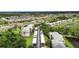 Aerial view of community with lake and parking at 2061 Willow Hammock Cir # 208, Punta Gorda, FL 33983