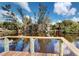 Relaxing view from wooden dock on calm water at 2376 Auburn Blvd, Port Charlotte, FL 33948