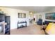 Living room with seating area and views into the dining area at 2376 Auburn Blvd, Port Charlotte, FL 33948