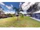 Spacious backyard with canal access and lush lawn at 2376 Auburn Blvd, Port Charlotte, FL 33948