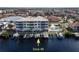 Aerial view of waterfront condo with private boat dock and pool at 268 Lewis Cir # 132, Punta Gorda, FL 33950