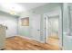Hardwood floors and views of the bathroom and additional rooms from entryway at 268 Lewis Cir # 132, Punta Gorda, FL 33950