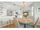 Casual dining area with a round table and wicker chairs at 268 Lewis Cir # 132, Punta Gorda, FL 33950