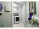 Laundry room with washer, dryer, and storage cabinets at 268 Lewis Cir # 132, Punta Gorda, FL 33950