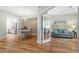 Dining room with hardwood floors, chandelier, and view to the living area at 268 Lewis Cir # 132, Punta Gorda, FL 33950