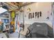 Storage area with pegboard, shelves, and grill at 268 Lewis Cir # 132, Punta Gorda, FL 33950