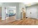 Elegant entryway with hardwood floors and a view of the living room at 268 Lewis Cir # 132, Punta Gorda, FL 33950