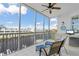 Spacious screened balcony with water views and outdoor seating at 268 Lewis Cir # 132, Punta Gorda, FL 33950
