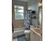 Clean bathroom with a tub, shower, and updated vanity at 5101 Pine Shadow Ln, North Port, FL 34287