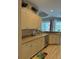 Well-equipped kitchen with ample cabinet space at 5101 Pine Shadow Ln, North Port, FL 34287