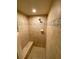 Large shower with built-in seat and decorative tile at 5101 Pine Shadow Ln, North Port, FL 34287