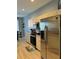 Modern kitchen with stainless steel appliances at 5101 Pine Shadow Ln, North Port, FL 34287