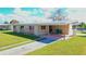 Ranch-style home with carport and canal-front lot at 554 Lindley Ter, Port Charlotte, FL 33952