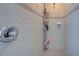Clean shower with tiled walls and multiple shower shelves at 5644 Cissus Ave, North Port, FL 34288