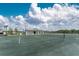 Full-size tennis court with adjacent clubhouse at 14151 Heritage Landing Blvd # 1021, Punta Gorda, FL 33955